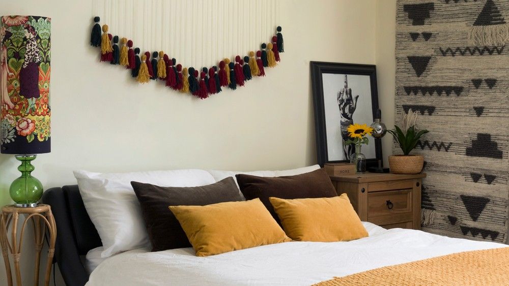 bedroom with macrame hanging and bedroom rug