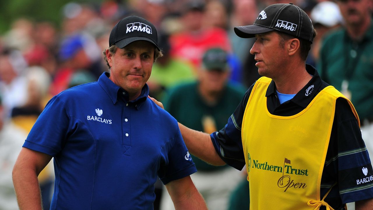 Phil Mickelson is congratulated by Jim Mackay after his 2009 Northern Trust Open victory