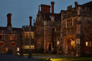 Rhinefield House Hotel at night