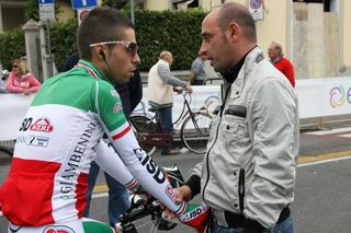 Italian team director Paolo Bettini has a word with Italian champ Giovanni Visconti