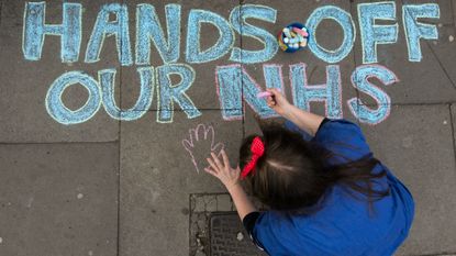 A junior doctor outside King's College Hospital in London during a two-day strike on Tuesday and Wednesday