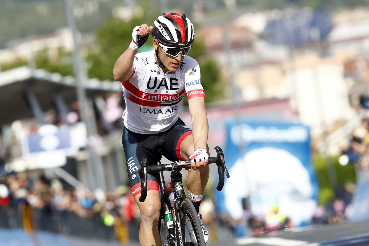 Conti celebrates taking pink as he crosses the line