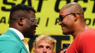 Francis Ngannou faces off with Renan Ferreira ahead of their fight.