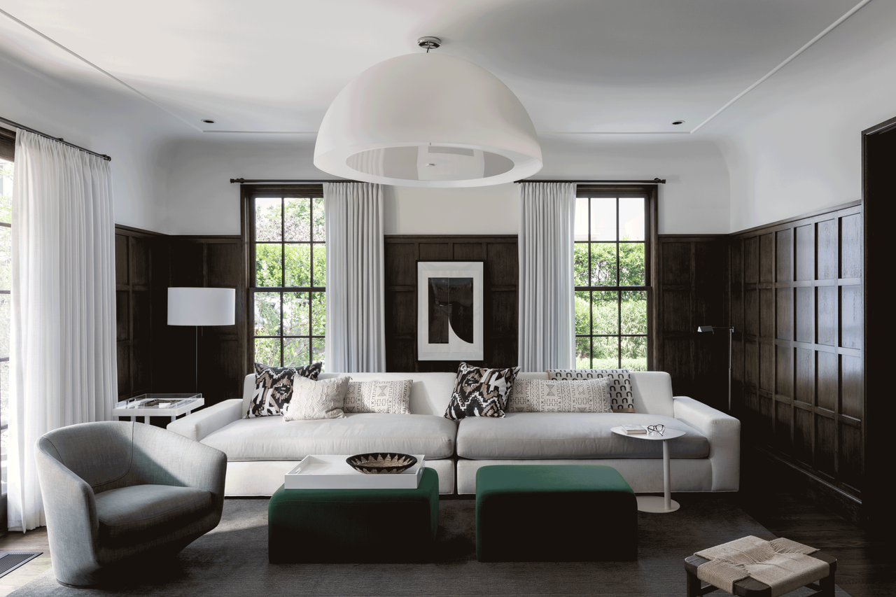 dark white living room with wooden paneling