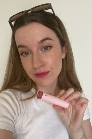 Grace Lindsay testing the Glossier lip crème