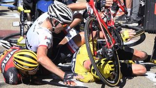 Bauke Mollema, Richie Porte and Chris Froome collide into the back of a motorbike on Mont Ventoux