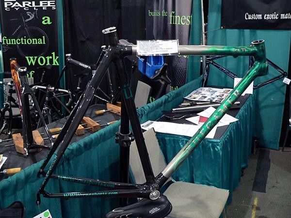 Brent Ruegamer is a newcomer when it comes to offering frames under his own label, but his lengthy experience in building carbon frames at another well-established carbon frame shop shows through in this unique custom carbon frame which features a titanium top tube and down tube.