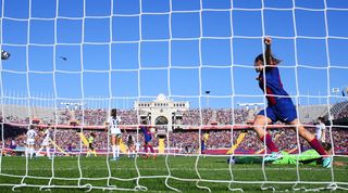 Aitana Bonmati celebrates after scoring Barcelona's first goal against Real Madrid at Montjuic in November 2023.