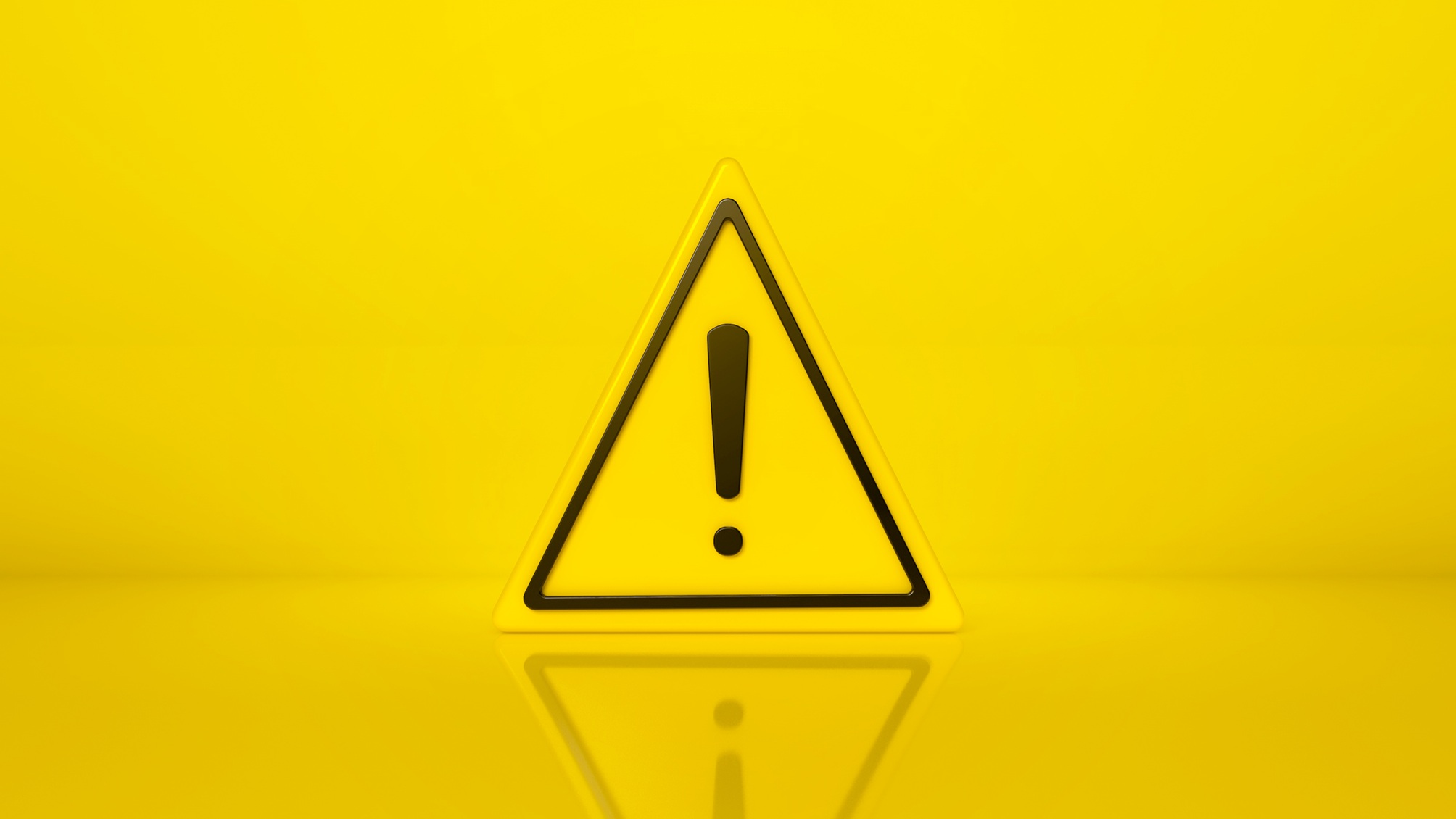 A yellow triangular hazard sign with an exclamation mark in the middle.