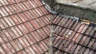 A shot of Julia's roof with the lead flashing very deteriorated
