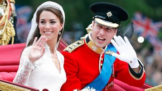 Prince William and Kate in a carriage following their wedding ceremony