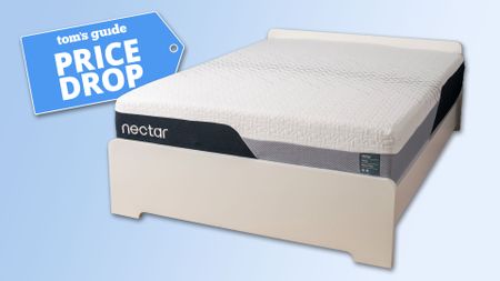The Nectar Premier Memory Foam Mattress on a white bed frame against a blue background, with a Tom's Guide price drop deals graphic in the top left corner