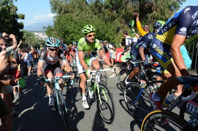 Jan Bakelants climbs alongside Peter Sagan