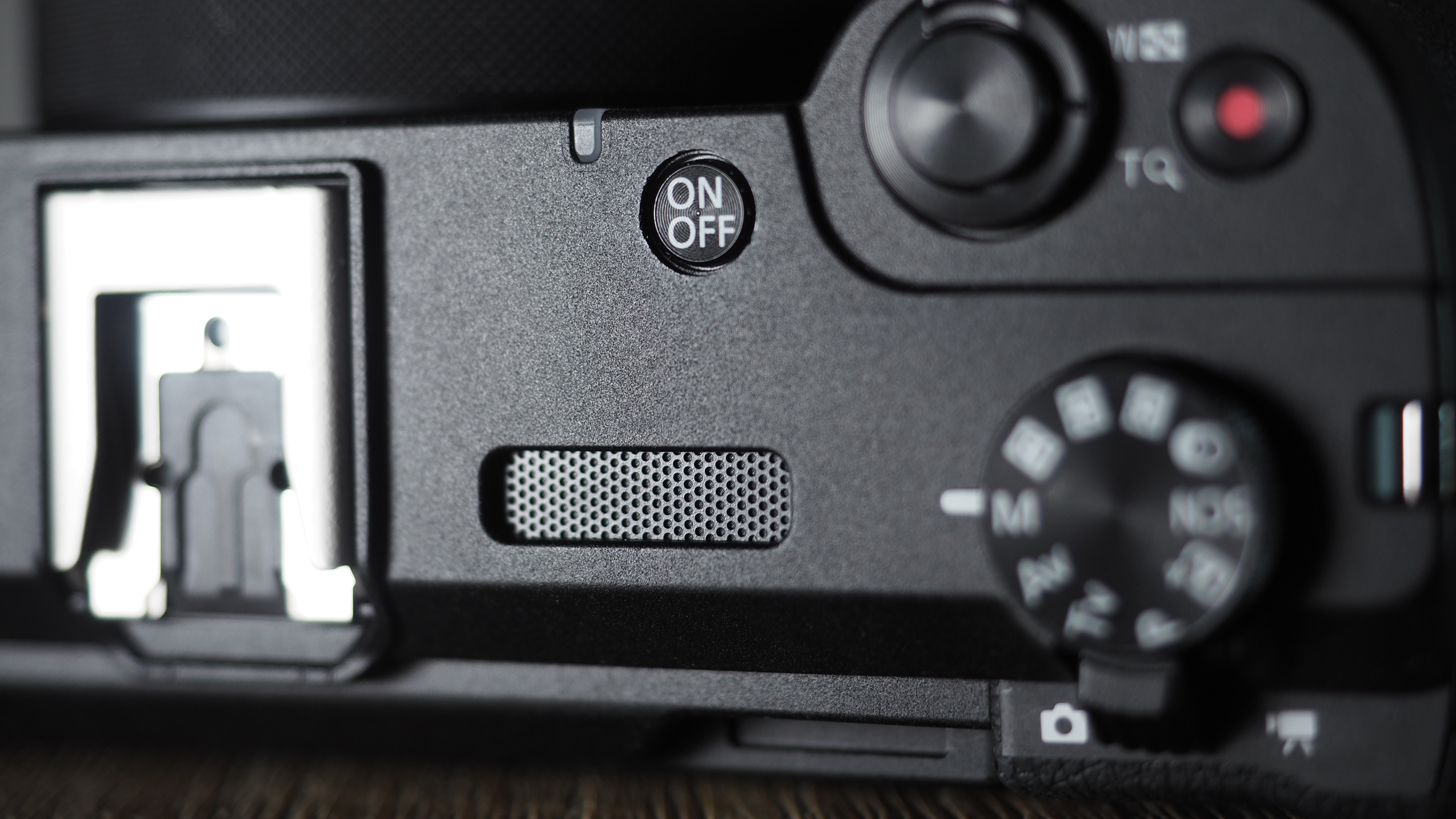 Canon PowerShot V1 on a wooden surface