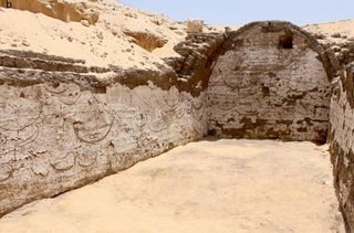 The interior of the structure is about 68 feet by 13 feet (21 by 4 m) and is covered with a tableau containing images of more than 120 ancient Egyptian boats. The images are incised into the white plaster. 