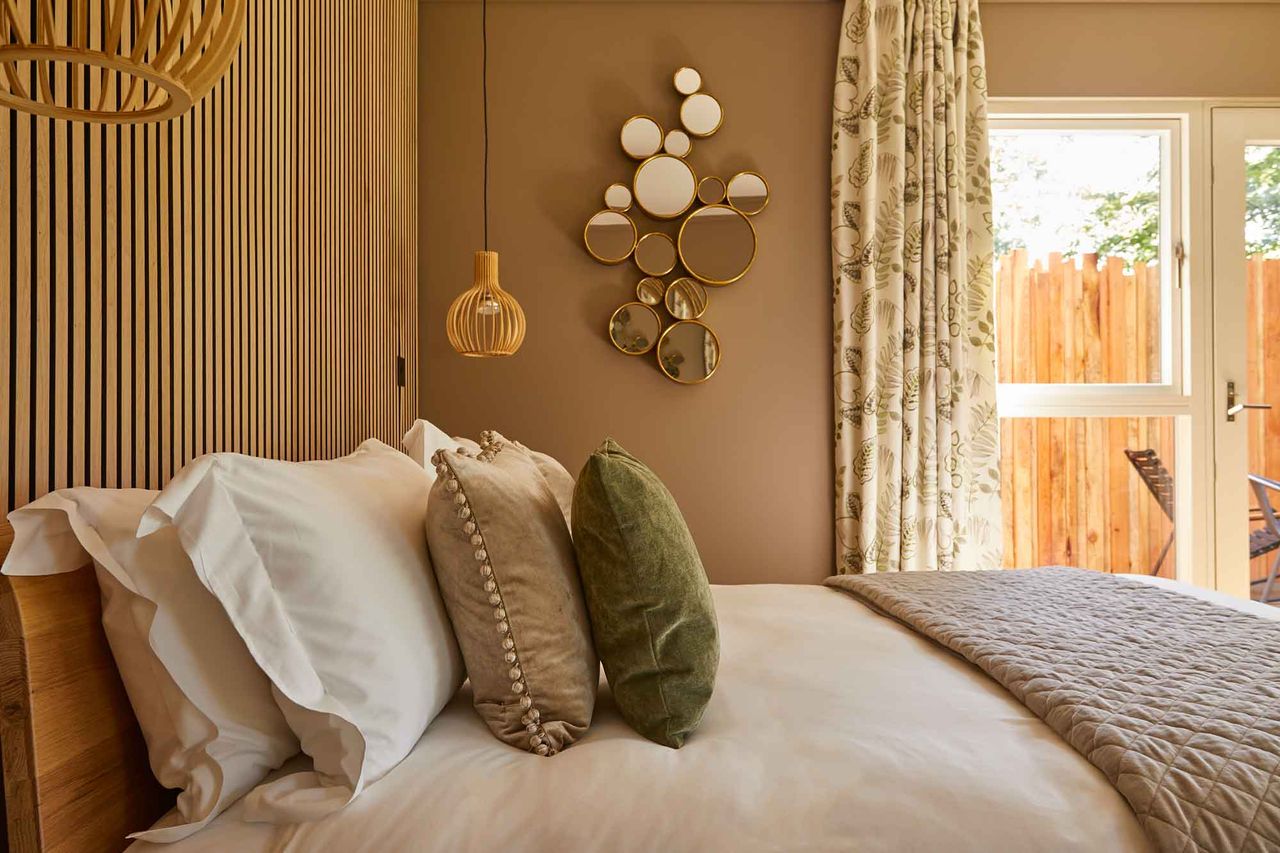 The bedroom of The Tawny's Primrose Retreat