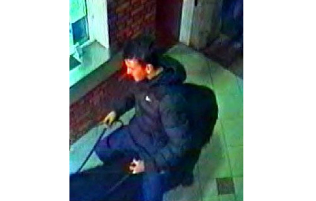 man rides into railway station