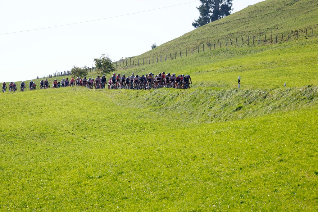 LAUSANNE SWITZERLAND OCTOBER 07 A general view of the peloton competing during the 1st Tour de Romandie Feminin 2022 Stage 1 a 1344km stage from Lausanne to Lausanne TDRwomen TDRF on October 07 2022 in Lausanne Switzerland Photo by Bas CzerwinskiGetty Images