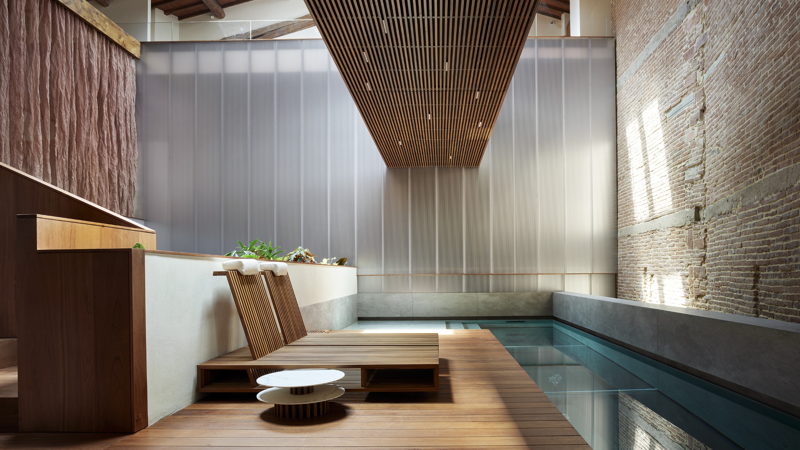 The architect's home features a suspended swimming pool