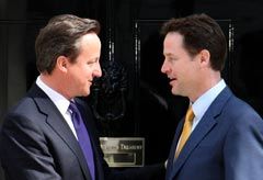 David Cameron and Nick Clegg enter Downing Street - coalition government