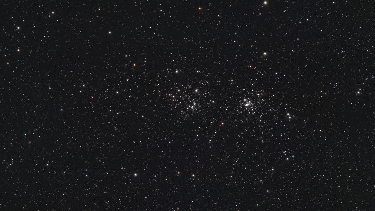 A photograph of the Double Cluster, taken with the Dwarf III smart telescope, processed in Pixinsight