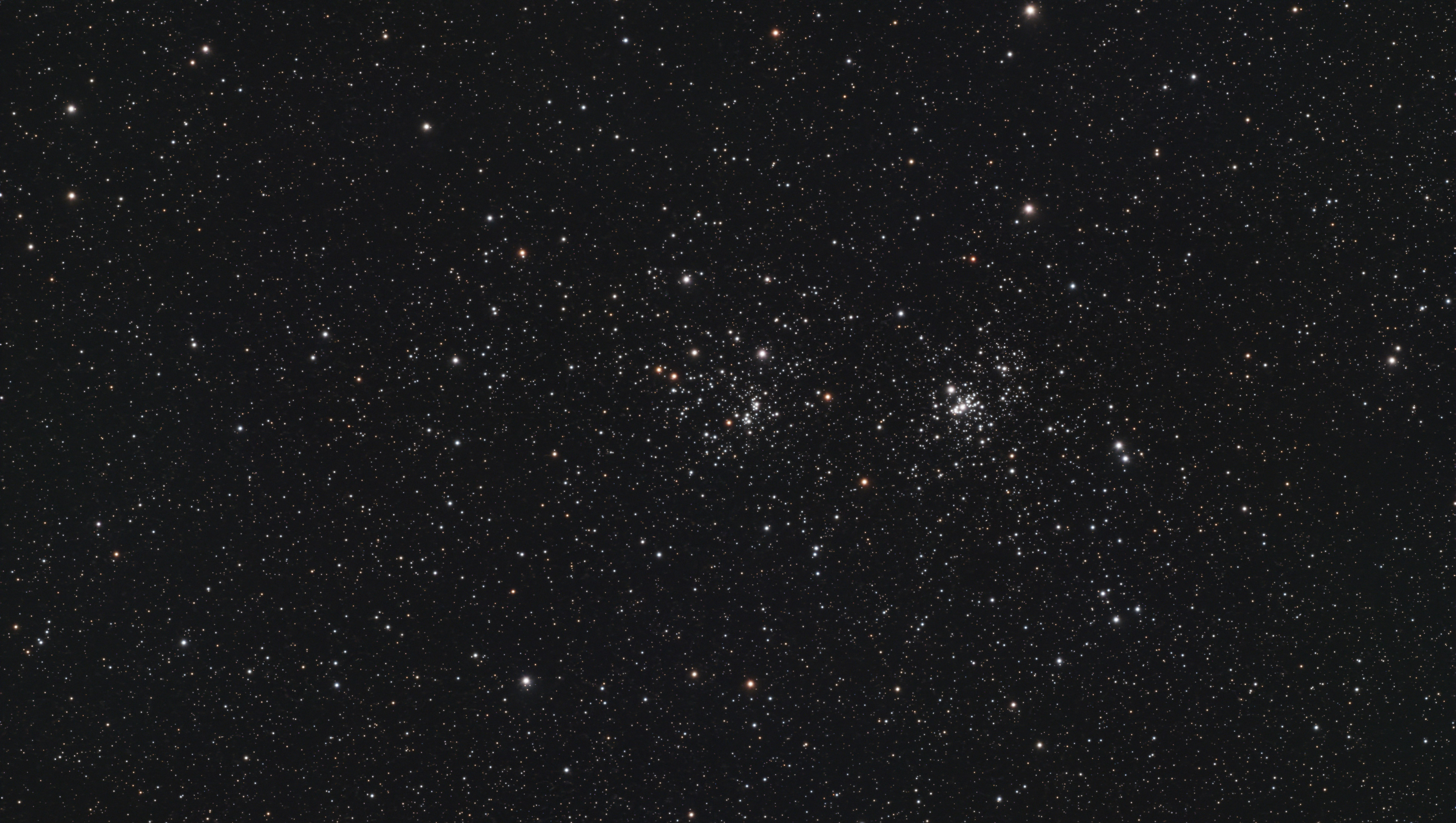 A photograph of the Double Cluster, taken with the Dwarf III smart telescope, processed in Pixinsight