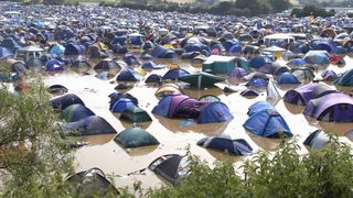 how to pitch a tent in the rain: festival flood