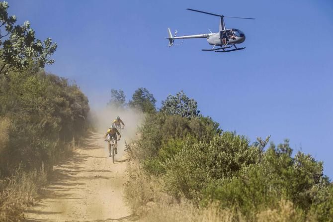 Karl Platt and Urs Huber of Bulls descend