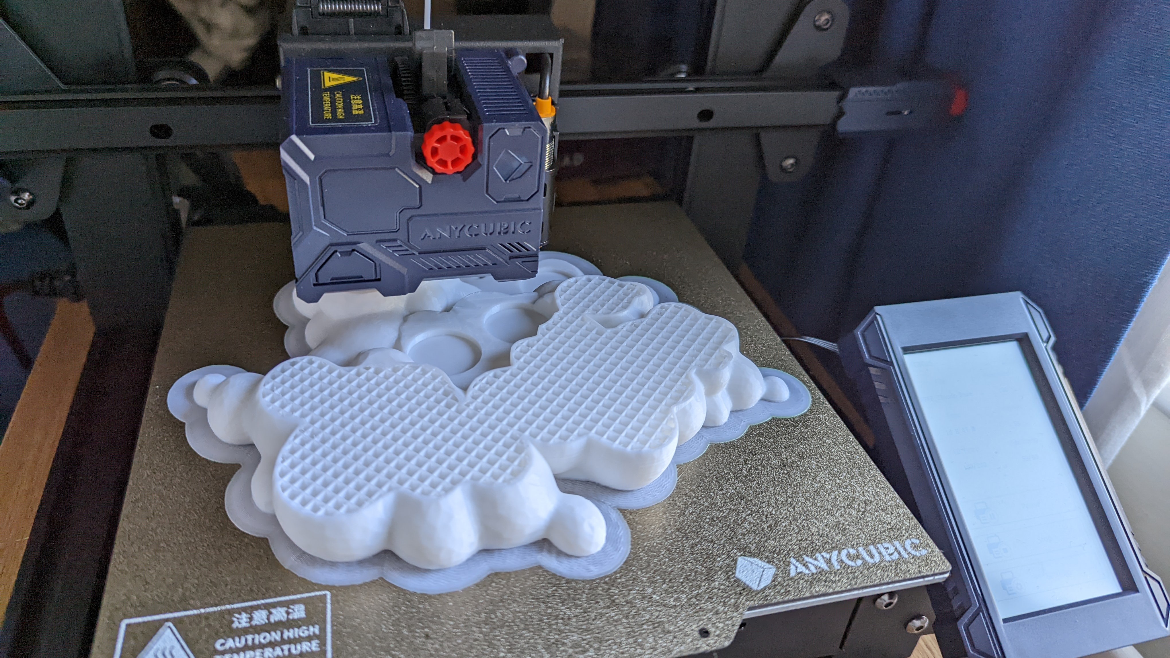 AnyCubic Kobra printing a model designed to look like clouds