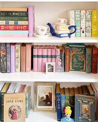 Bookshelf with books and figurines