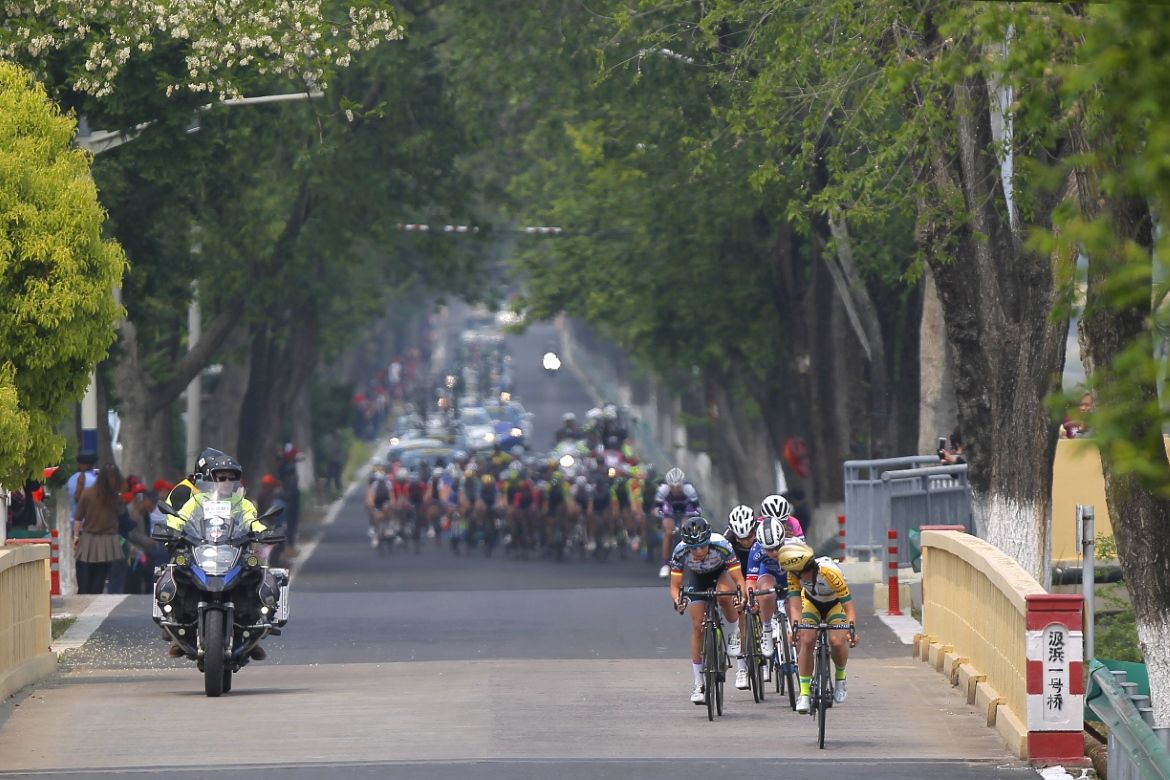 The breakaway riders go clear of the bunch