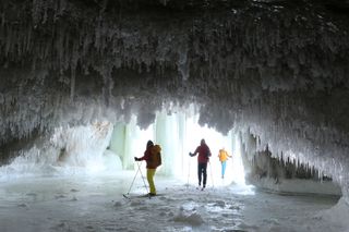 Pictured Rocks National Lakeshore in Michigan offers scenic excursions, such as this ice cave, for cross-country teams.