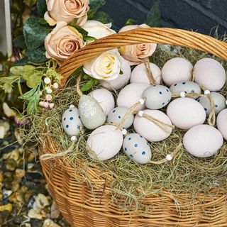 eggs in basket and flowers