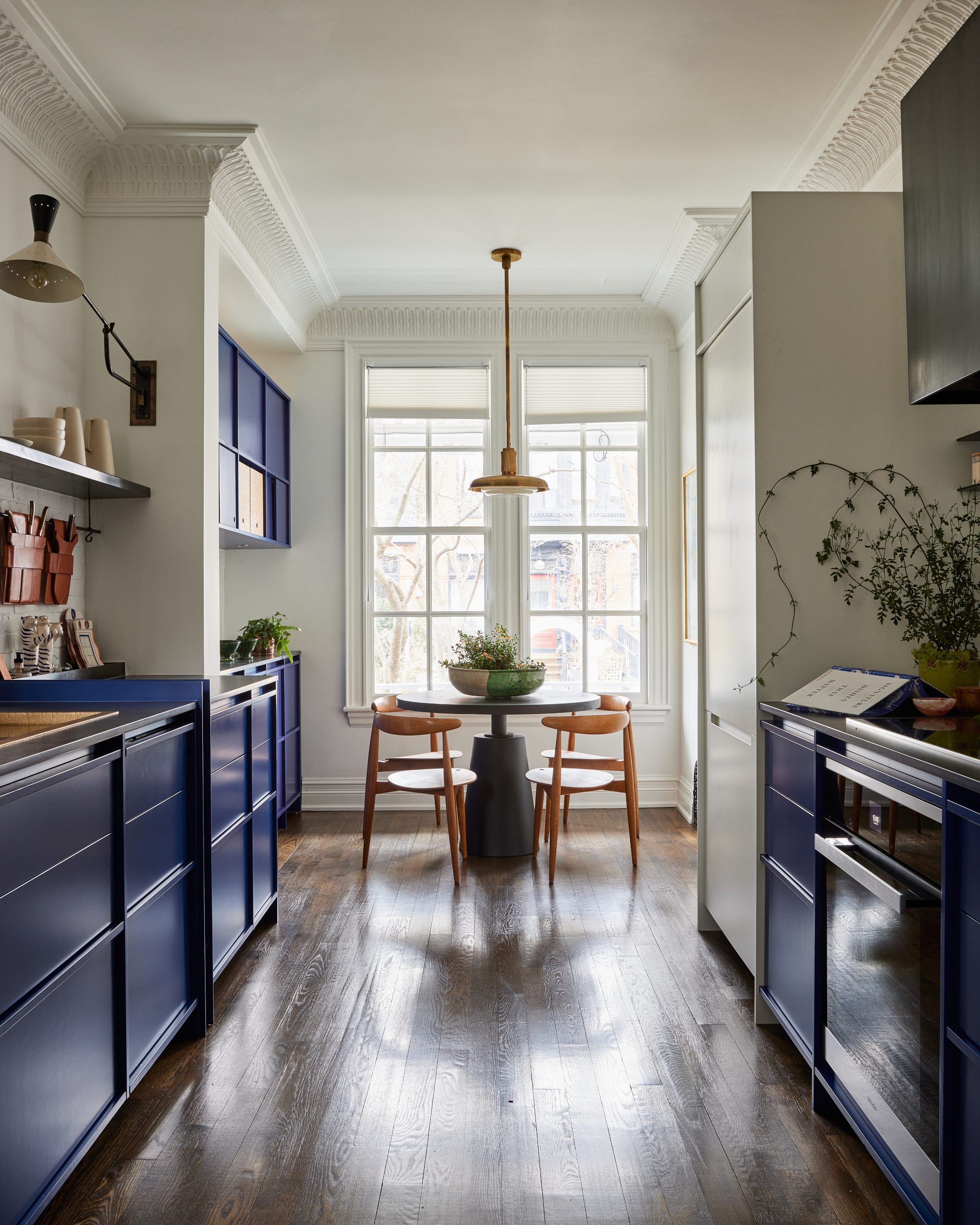 Kitchen with sleek cabinetry in International Klein Blue