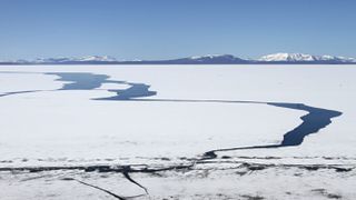 Yellowstone's lake's ice cover has remained unaffected by increasing temperatures due to increased snowfall. But this could make it vulnerable to a sudden shift.