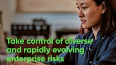 Whitepaper cover with green title over image of a female using a keyboard at a desk