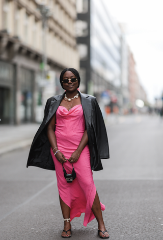 woman in pink slip dress and black leather blazer