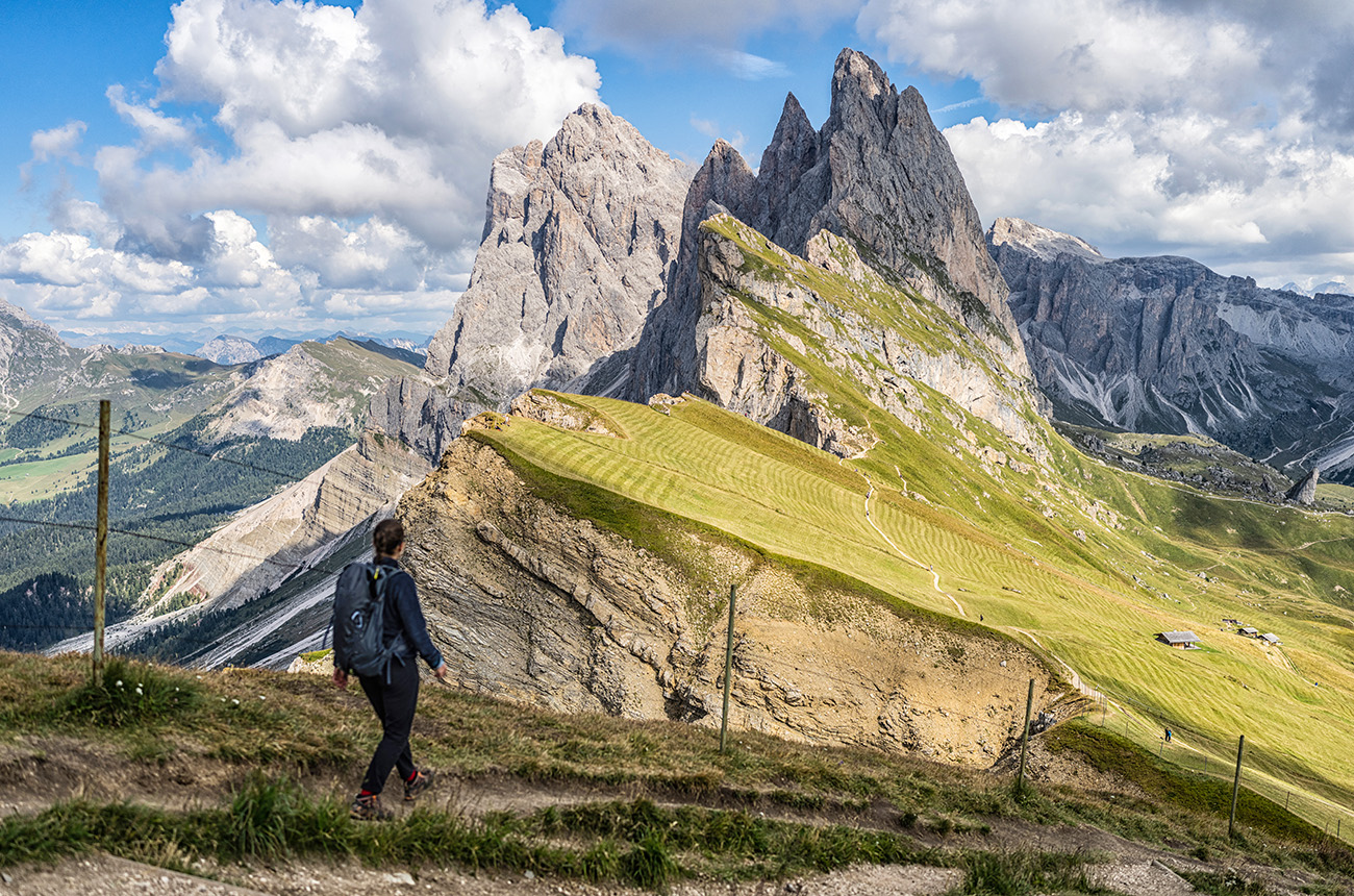 A lady hiking in the Dolomites