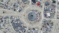 Vantor satellite image shows the center of the Burning Man festival site in Black Rock City with its distinctive circular layout and numerous temporary structures