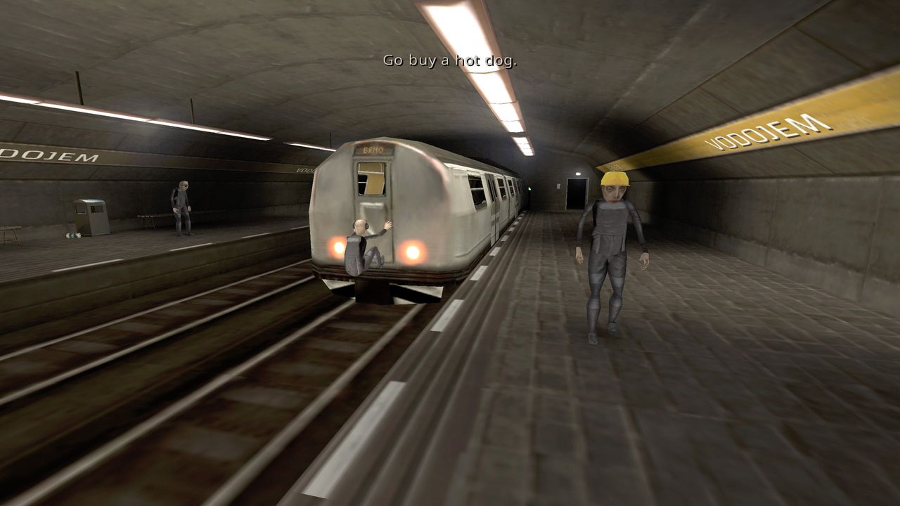 Brno Transit man hanging off end of train