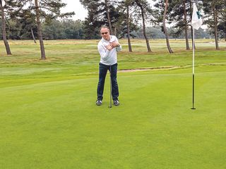 Golf Monthly Top 50 Coach Andy Gorman demonstrating the role of the right shoulder in the putting stroke