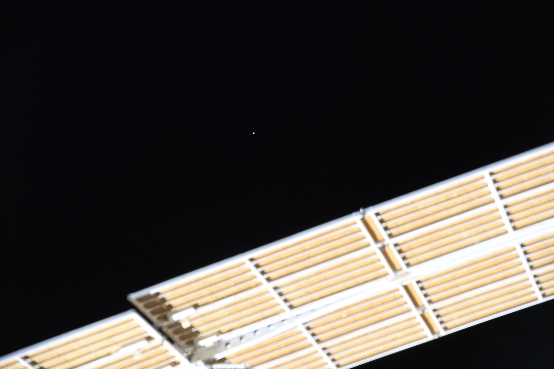 Boeing's Starliner OFT-2 spacecraft approaches the International Space Station in this stunning photo by European Space Agency astronaut Samantha Cristoforetti.