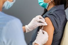 A person receiving a vaccine.