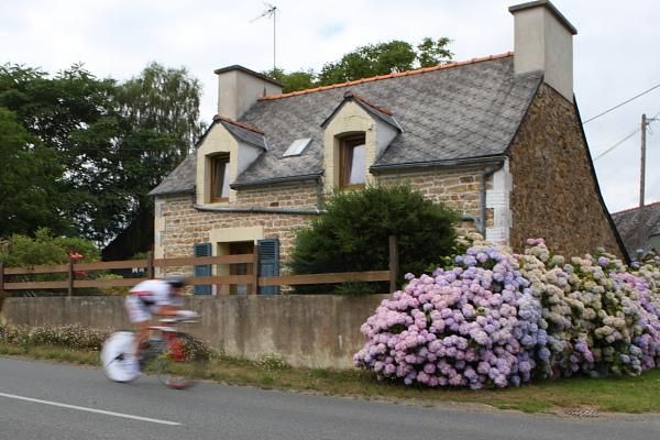 Olga Zabelinskaya (Safi-Pasta Zara) speeds past a typical house in Bretagne.