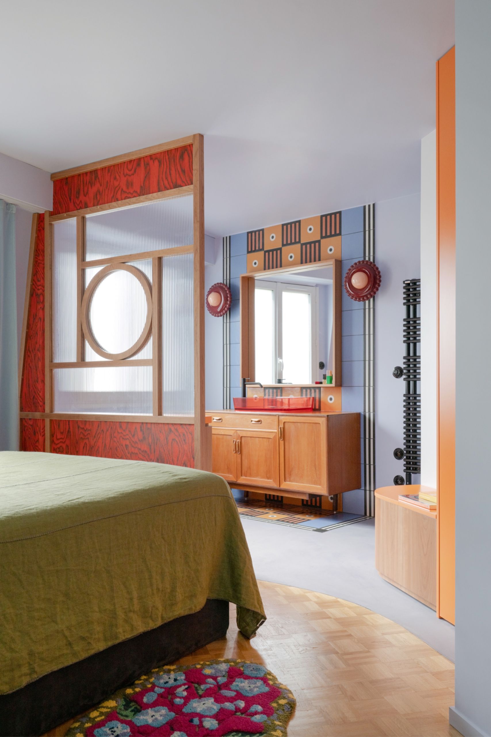 A bedroom and bathroom in one