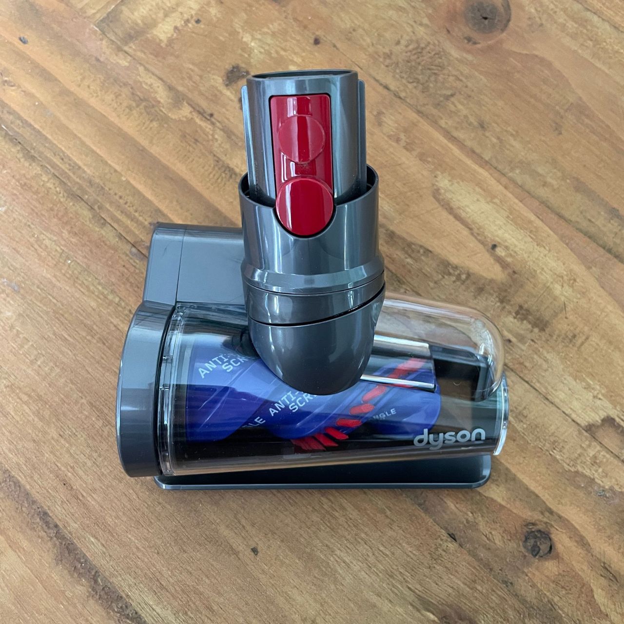 Dyson hair screw tool on a wooden table