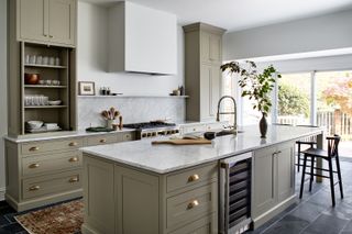 A kitchen island with storage and seating