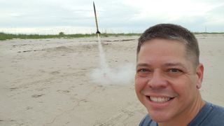 NASA astronaut Bob Behnken takes a selfie with a model rocket launching from Florida's Atlantic coast on May 26, 2020. 