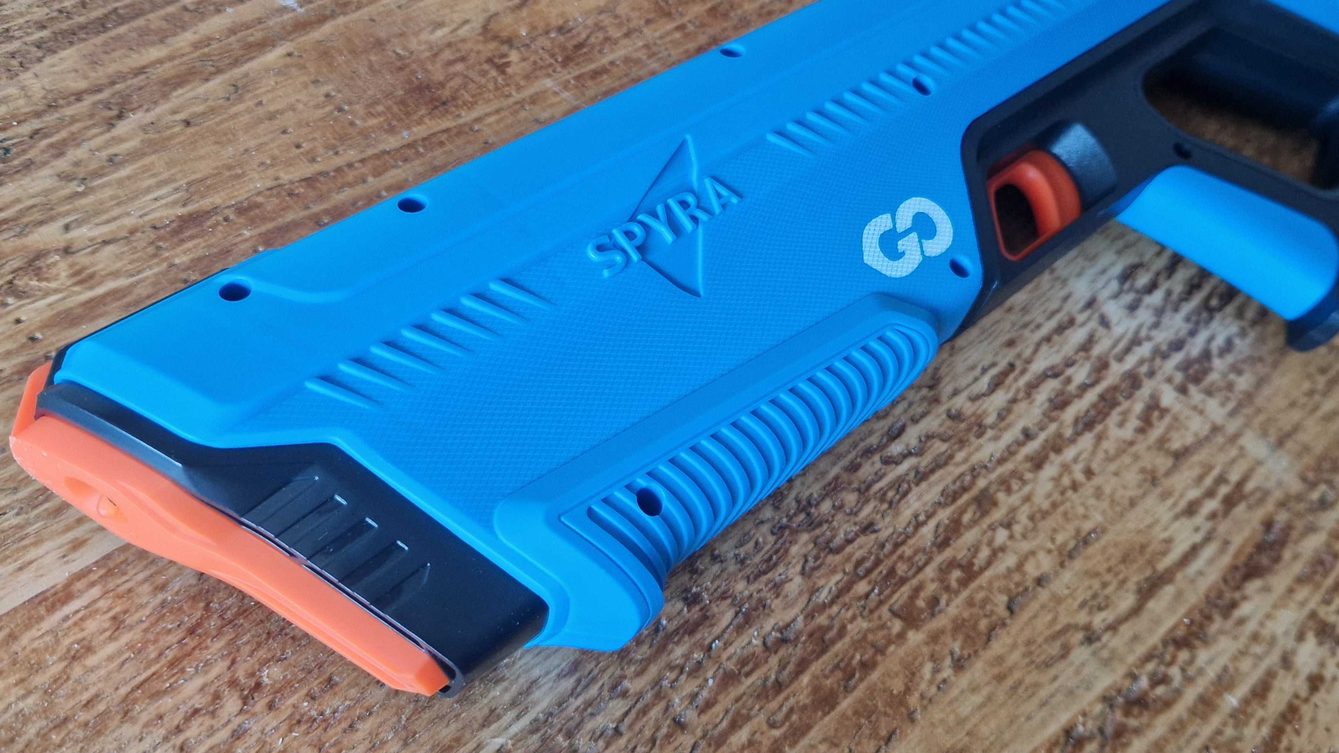 SpyraGo lying on a wooden surface