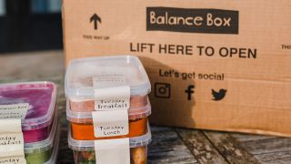 Balance Box meals in front of the delivery box